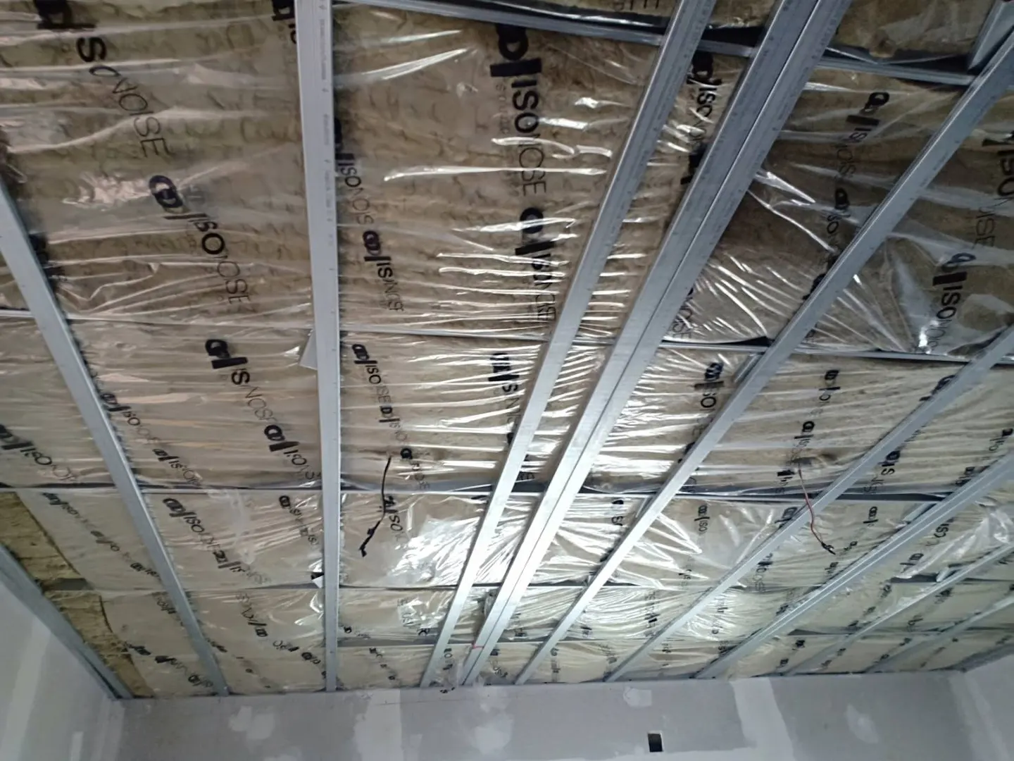Site photo of ISO NOISE sound insulation being installed (3)