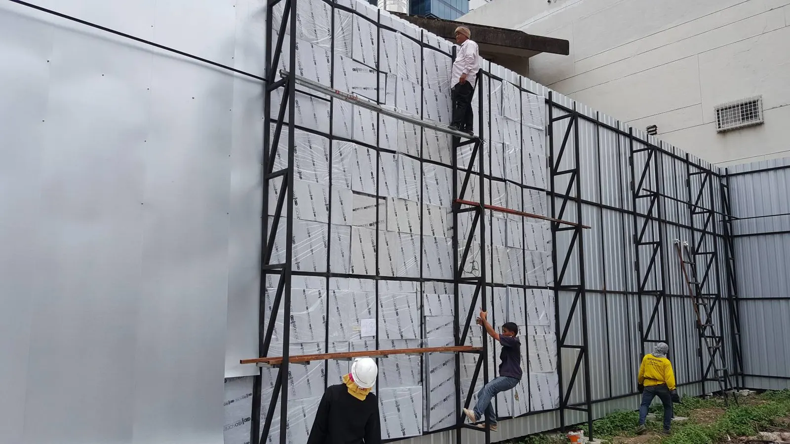Site photo of ISO NOISE sound insulation being installed (2)